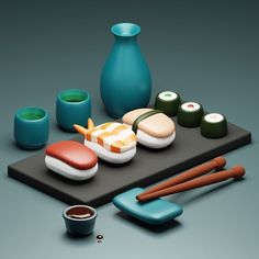 an assortment of sushi on a tray with chopsticks and saucers next to it