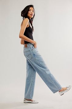 *The* perfect retro-inspired jeans from Levi's. **Fit:** Mid-rise, straight-leg silhouette with slouchy fit **Features:** Zip fly and button closure, five-pocket design, rigid denim fabrication **Why We | Levi's Baggy Dad Jeans at Free People in Light Wash, Size: 29 Levi’s 94 Baggy Jean, Levis Baggy Dad Jeans, Shoes With Straight Leg Jeans, Levi’s Baggy Dad Jeans Outfit, Baggy Levis Outfit, Mid Rise Baggy Jeans, Baggy Dad Jeans Outfit, Mid Rise Jeans Outfit, Levis Dad Jeans