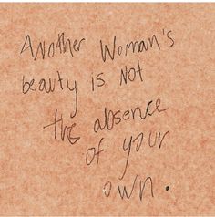 someone wrote this on the wall in front of their house that says another woman's beauty is not the presence of your own