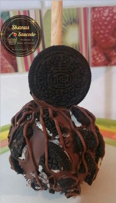 an oreo cookie ice cream ball on a plate