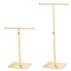 two wooden stands with hooks on each side