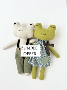 two stuffed animals with a sign that says bundle offer on it's front and back