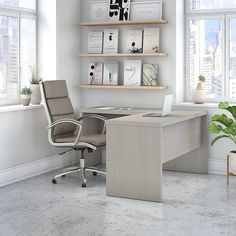 an office with a desk, chair and bookshelf