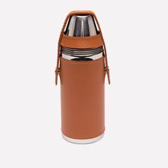 thermos bottle holder is made from genuine leather and has two cups in it