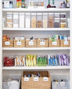 an organized pantry with baskets and food items