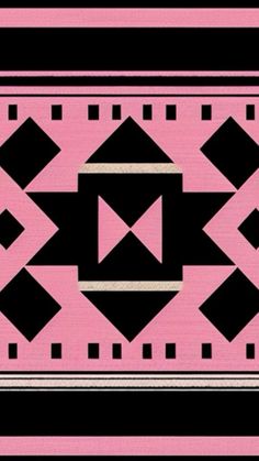 a pink, black and white rug with an arrow on it