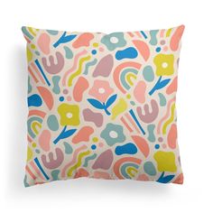 a colorful pillow with an abstract pattern on it