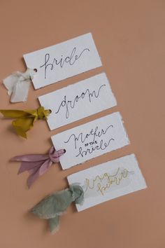 four pieces of paper with different types of flowers on them and the words bride groom written in cursive writing