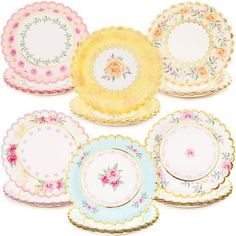 six plates with flowers on them are lined up against a white background and one is yellow, the other has pink roses