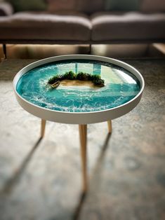 a coffee table with an island in the middle