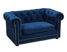 a blue couch with studded arms and buttons on the arm, sitting against a white background