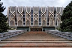 a large building with stairs leading up to it