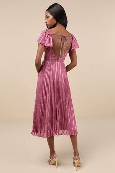 When it comes to event dressing, you'll be a step ahead with chic pieces like the Lulus Standout Sophistication Mauve Lurex Flutter Sleeve Midi Dress! This radiant dress is composed of lightweight woven fabric with a subtle striped burnout design accented by Lurex threading. Short flutter sleeves (with elastic at the shoulders) frame a surplice bodice with a stunning V-back, crossed by a single tie. Skirt has a classic, A-line silhouette and finishes at a midi hem. Hidden zipper/clasp at back. F Tie Skirt, Dress A Line, Sleeve Midi Dress, Midi Dress With Sleeves, Flutter Sleeves, Threading, Flutter Sleeve, Hidden Zipper, Woven Fabric