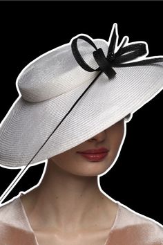 Elegant White Derby Hat With Feather & Bow Exclusive Ladies Headwear by DIVA HATS. Women head accessories for weddings, routs, parties, derby. Ready-to-wear hats that respond to all the latest trends in fashion. Look at your very best, this charming derby hat glorifies your personality and enhances the positivity of your etiquette on all occasions. Whether you are attending a wedding reception, Kentucky derby or visiting any other formal or informal event, it accentuates your style an.. Elegant Formal Top Hat For Spring, Elegant Formal Fascinator With Flat Brim, Elegant Flat Brim Fascinator For Formal Occasions, Elegant Adjustable Cloche Hat For Party, Formal White Brimmed Mini Hat, Elegant High Crown Mini Hat For Spring, Elegant Mini Hat With High Crown For Spring, Elegant Mini Hat With Flat Brim For Formal Occasions, Elegant Mini Hat With Flat Brim For Formal Events