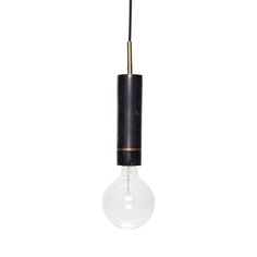 a black and gold light bulb hanging from the ceiling