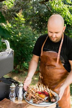 Surprise him this holiday season with a personalized leather apron, the perfect Christmas gift for your husband. Ideal for grilling or cooking, this custom gift for him adds style and function to his BBQ gear. These leather men's aprons make a unique addition to his BBQ grill accessories, combining durability and craftsmanship for any kitchen or outdoor chef Mens Aprons, Leather Strap Shelves, Husband Christmas Gift, Shelf Accessories, Butcher Apron, Woodworking Apron, Apron For Men, Handmade Aprons, Bbq Apron