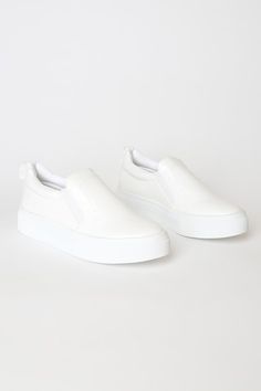 Lulus Exclusive! Your classic sneaker gets a major upgrade with the Lulus Cassay White Crocodile-Embossed Platform Slip-On Sneakers! Shiny crocodile-embossed faux leather shapes these slip-on sneakers that have a rounded toe upper and elastic gussets for fit. Pull tab at back. 1.5"" white bumper sole. Lightly cushioned insole. Rubber sole has nonskid markings. All Man Made Materials. Imported. Lulus | Cassay White Crocodile-Embossed Platform Slip-On Sneakers | Size 6. Platform Slip-on Sneakers With White Sole, White Slip-on Platform Sneakers, White Slip-resistant Synthetic Sneakers, White Slip-on Platform Sneakers With Rubber Sole, White Sole Rubber Slip-on Platform Sneakers, Converse Design, Platform Slip On Sneakers, Best White Sneakers, Flatform Sneakers