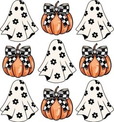 halloween pumpkins with black and white bows are arranged in the shape of ghost's heads