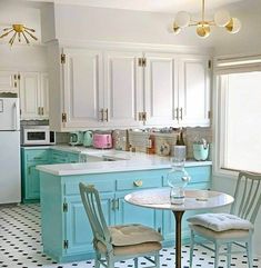 the kitchen is clean and ready to be used as a dining room or breakfast nook