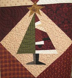 a quilted christmas tree with a star on top