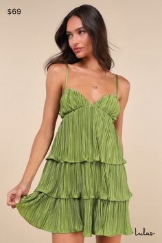 The undeniable party presence of the Lulus Sleek Dedication Green Satin Plisse Cutout Tiered Mini Dress means that it was made to own the dance floor! Luxe, plisse-pleated woven satin shapes this stunning dress that features a sleeveless bodice with an alluring V-neckline and adjustable spaghetti straps. The high, empire-style waist features trendy twin cutouts at the sides, all atop a tiered A-line skirt that finishes at a too-cute mini hem. Hidden back zipper/clasp. Fit: This garment fits true Cute Flowy Dresses, Tops Fall Outfits, Trendy Maxi Dresses, Fall Trends Outfits, Tiered Mini Dress, Green Mini Dress, Wedding Guest Dresses, Grad Dresses, Movie Reviews