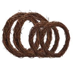 three brown wreaths sitting on top of each other