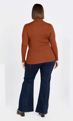 Discover effortlessly chic and comfortable styling with the Mia Sweater. Expertly tailored to fit your curves, this piece shows off full length sleeves, stretch rib fabrication and a turtle roll-over neckline! Key Features Include: - Turtle roll-over neckline - Full length sleeves - Pull over style - Stretch rib fabrication - Hip length hemline Go for classic skinny jeans and tall boots. | Plus Size Mia Sweater in Toffee, Size 14 | City Chic Boots Plus Size, Plus Size Jumpers, Plus Size Clothing Online, Plus Size Outerwear, Tall Jeans, A Turtle, Tunic Tank Tops, Plus Size Sweaters, Petite Jeans