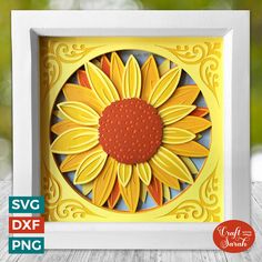 a paper cut sunflower in a frame on a wooden table with the text svg dxf file