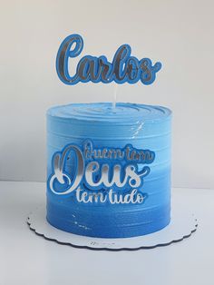 a blue cake with the words carbos on it