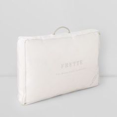 a white pillow with the words frette on it