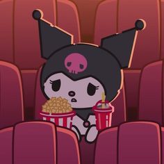 a cartoon character sitting in the middle of a movie theater holding a drink and popcorn