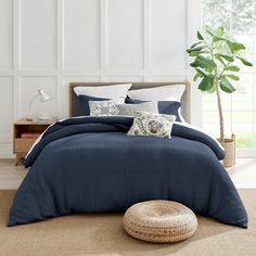 The Mills Waffle Navy Duvet Cover Set by Levtex Home is hip and contemporary. Offered in navy, this design will immediately transform your bedroom. Made with a durable cotton, this duvet cover set features a waffle pattern. It has a navy waffle on the front and a 100% cotton solid on the reverse. It closes with easy to use, durable buttons. The Mills Waffle Navy Duvet Cover Set is machine washable and includes the duvet (68 x 88in.) and one standard pillow case (26 x 20in.) Enjoy this for years Navy Duvet Cover, Navy Blue Duvet Cover, Navy Blue Bedding, Teal Duvet Cover, Navy Duvet, Navy Bedding, Navy Design, King Duvet Set, Blue Comforter