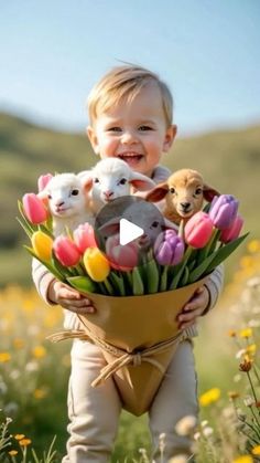 a little boy holding a bouquet of flowers with puppies in the front and behind him