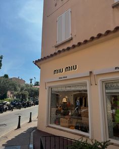 the store front of an old fashion clothing store