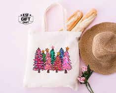 Colorful Christmas Tree Totes, Christmas Gift Bag, Xmas Party Bag, Merry Xmas Bags, Christmas Tree Tote, Xmas Present Bag, Family Xmas Gifts Blank Option Comes Without Any Design Personalized tote bags are perfect for yourself, Your Company, or as a gift! These are also the Best Christmas Gift Option For You Or your Family And Friends. !IMPORTANT! Blank Option Only For Blank, Nothing Will be Print That Option PRODUCT *Measurements15"L x 16"H *12 oz./yd² (US), 20 oz (CA), 100% heavy cotton canvas *20" canvas webbed handles * 9" handle drop *Made from Heavy duty cotton canvas fabric *DTF printing for the best color quality * Bulk discounts are available upon request. *Put N/A In the personalization Box For  Blank Tote Bag  Check the Tote bag Color And Text Color Chart In display Pictures Bef Red Christmas Gift Bags, Christmas Tote Bag Gift, Christmas Tote Bag As Gift, Christmas Gift Tote Bag, Christmas Tree Tote, Blank Tote Bag, Present Bag, Display Pictures, Colorful Christmas