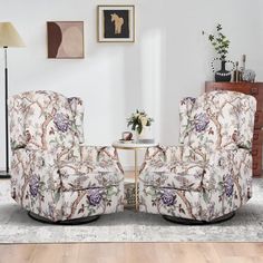 two chairs sitting next to each other in a living room