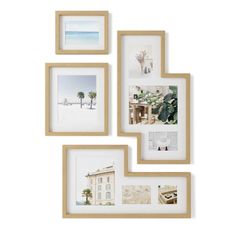 four frames with pictures hanging on the wall