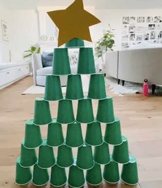 a christmas tree made out of green cups