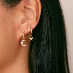 Star and Moon Huggie Hoop Earrings  ◇ Earrings measures approx.:  Hoop outer diameter: 12mm / inner Diameter: 9mm Charm approx. 8mm (handmade earrings vary slightly) ◇ These earrings are sold as pair. ◇These earrings will arrive in an eco-friendly jewelry paper box, making it a nice gift to give a friend or keep for yourself. ◆ View more EARRINGS https://www.etsy.com/shop/eplusfjewelry?section_id=13190709 ◆ View ALL ITEMS https://www.etsy.com/shop/EFHANDMADEJEWELRY shop policies: https://www.ets Moon Star Earrings, Trendy Moon Charm Drop Earrings, Trendy Dangle Earrings With Moon Charm, Dainty Dangle Hoop Earrings With Moon Charm, Hoop Earrings With Charm, Star Earrings Dangle, Unique Ear Piercings, Jewelry Hoop Earrings, Moon Earring