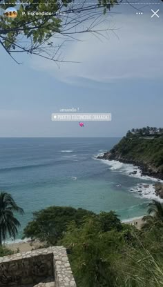 an ocean view from the top of a hill