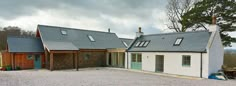 a large house with two garages on top of it