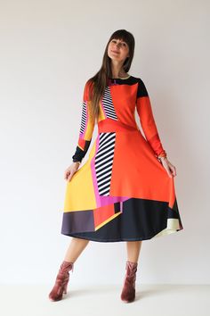 AMBER midi DRESS  The original abstract print design on the dress is created by a professional artist. Colourful abstract print dress with geometrical elements, with long sleeves. Be unique. Be outstanding. Be authentic. Bright and lively colors have the power to uplift mood and instill a sense of joy. Wearing a vibrant color dress can evoke feelings of happiness and positivity, brightening not only the wearer's day but also those around her. The dress showcases an original abstract print design Bold Pattern Dress, 80s Style Dress, Dress For Women Party, Style Désinvolte Chic, Party Dress For Women, Abstract Print Dress, Dress Trendy, Dress Art, Color Block Dress