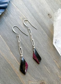 "* Silver-plated brass paper clip chain earrings wire wrapped with polished eudialyte gemstones.  * Antique silver-plated ear wires. * Drop length: approx. 2 3/4\" Measurement is from the top of the ear wire to the bottom of the stone. * All orders are shipped in a gift box with a stamped logo dust bag. Multiple item orders will be packaged in one box to reduce waste.  * Follow on Instagram: @starsandstonesjewelry" Chain Earrings Dangle, Brass Hoop Earrings, Bezel Earrings, Earrings Wire, Labradorite Earrings, Agate Earrings, Moonstone Earrings, Follow On Instagram, Moonstone Jewelry