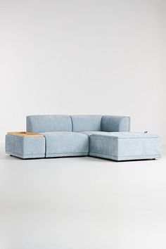 Build a cozy and textured respite to accommodate your space — and family — with this modular series featuring corduroy upholstery. Our completely customizable modular series offers an effortless gateway into contemporary decor. Each modular component is sold separately, allowing you to build the sofa shape or seating arrangement that fits your space and your lifestyle. For ordering assistance and more, please contact us For aesthetic advice and tips to help decorate your space, enjoy our complim Narrow Seating Area, Small Storage Ottoman, Stylish Coffee Table, Corner Chair, Functional Storage, Armless Chair, Seating Arrangements, Storage Ottoman, Contemporary Decor