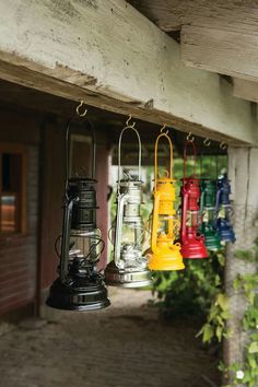 colorful lanterns hanging from the side of a building