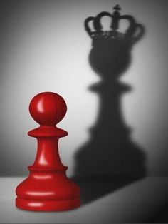 the shadow of a red chess piece on a gray background