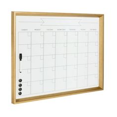 a dry erase board mounted on a wall