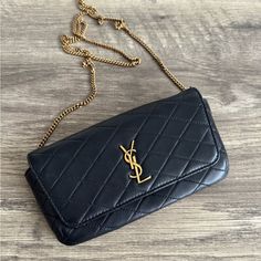 Like New. Hardware And Chain Pristine. Lambskin Smooth. Perfect For Phone, Cardholder And Lipstick. Crossbody Length Chain. Lowball Offers Will Be Ignored. Ysl Phone Holder Bag, Saint Laurent Phone Holder Bag, Ysl Sunset Chain Wallet, Uptown Chain Wallet Ysl, Ysl Crossbody Bag Black Tassel, Yves Saint Laurent Bags, Phone Bag, Yves Saint Laurent, Saint Laurent