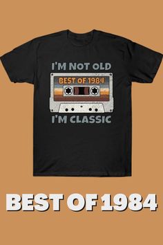 Vintage Retro Big Cassette Tape BEST OF 1984 Vintage Classic Music T-Shirt - birthday present for men and women who are born in 1984. Classic vintage 1984 retro bday gift for mom, dad, husband or wife. Featuring retro cassette tape printed onto the front. Great, cool, original Music Cassette Tape Design for men and women. Vintage original Gift for your family or friends. Awesome present for dad, father, brother, sister, husband, boyfriend, uncle, girlfriend,  mother, wife, aunt, colleague.