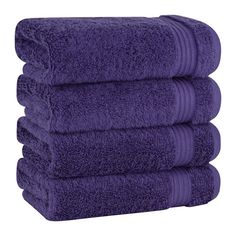 six purple towels stacked on top of each other